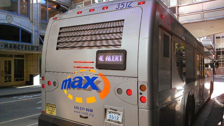 enoughkc's tweet photo. @RideKCTransit . Even with a flawed sign, a #MAXclassic bus has more character than a boring red #MAXposer. IMO. https://t.co/IyHmUZripV