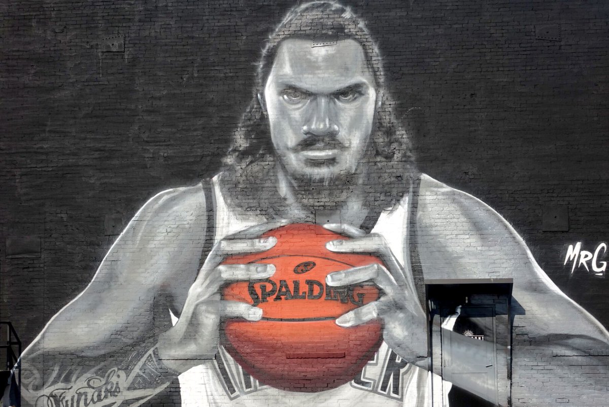okcthunder's tweet photo. Already larger than life, Steven Adams gets even larger as NZ artist Graham Hoete (MrG) completes his mural in OKC! https://t.co/oMs8wa8sYw