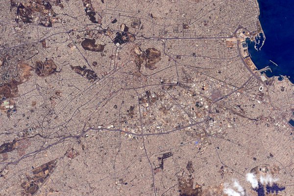WordDebt's tweet photo. A year ago, @StationCDRKelly shared this photo of Athens from space. #Astronaut comes from Greek "Astros". #WordDebt https://t.co/0dRbOMThRD