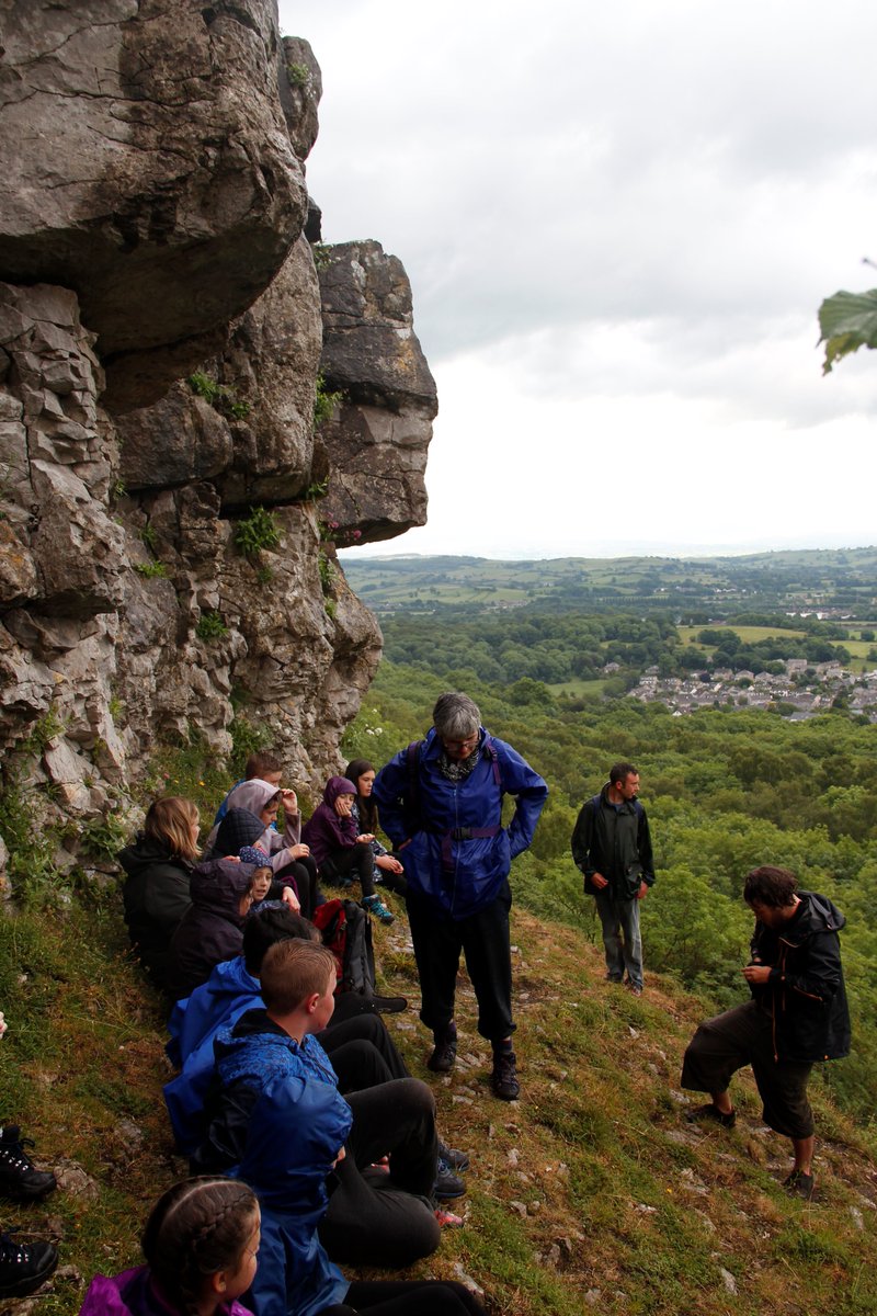 St Bernadette's primary school enjoying their first afternoon scrambling on Warton crag in the rain!