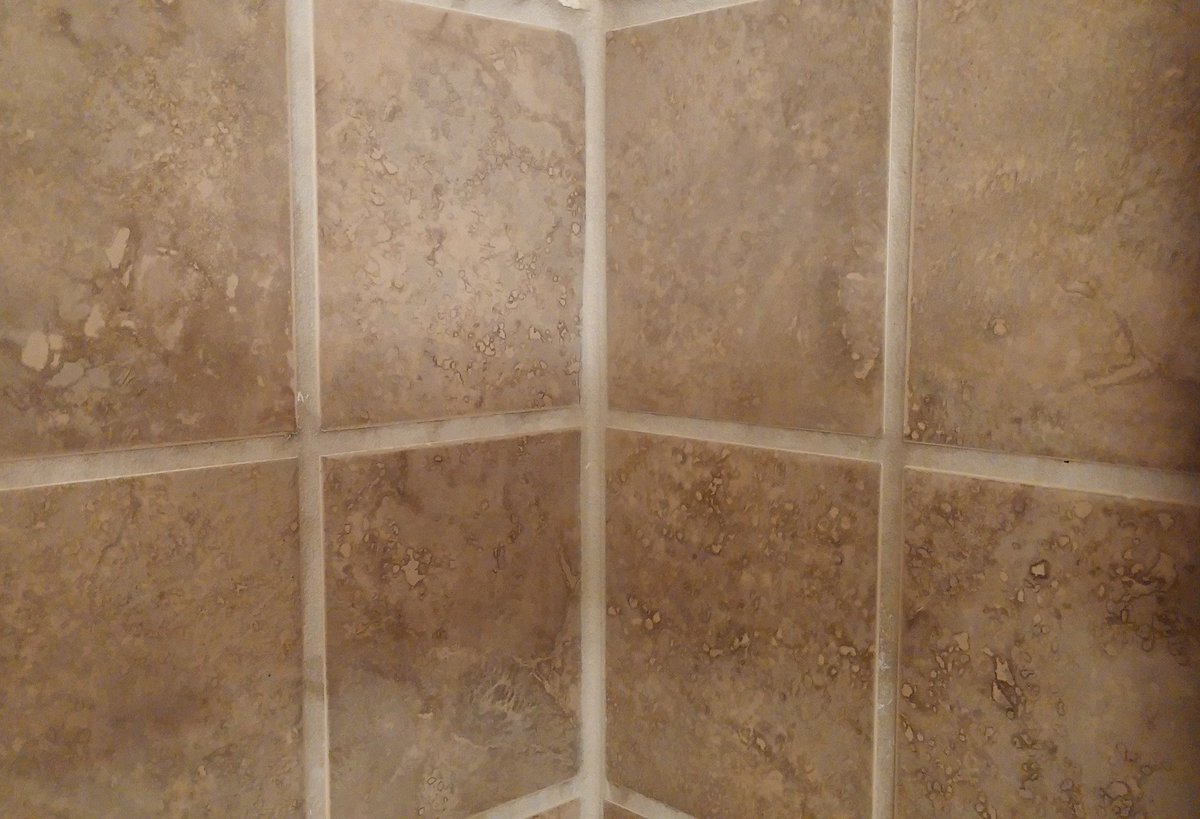 Cleaning grout can be tedious, but we make it easy! Mix baking soda and water together and rub the stain clean.