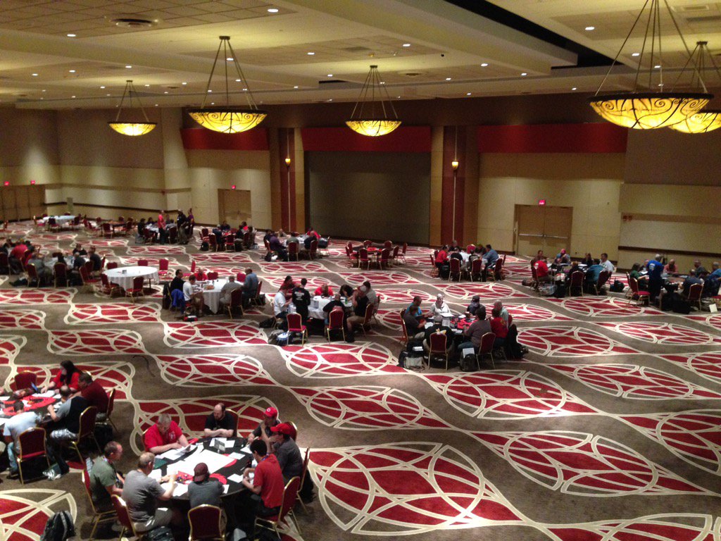 mikemearls's tweet photo. The view from the upper balcony at #origins2016 -  tables spaced to cut down noise, aim for a great play environment https://t.co/VmEMfslKXb