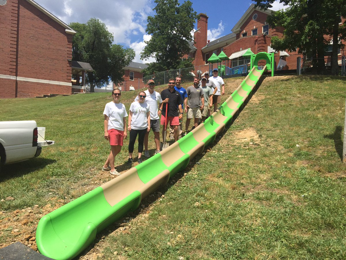 caring4children's tweet image. Thanks to @playcorenews, @EMJCorp and @AccentConstServ for installing our new hillside slide. The kids will love it!