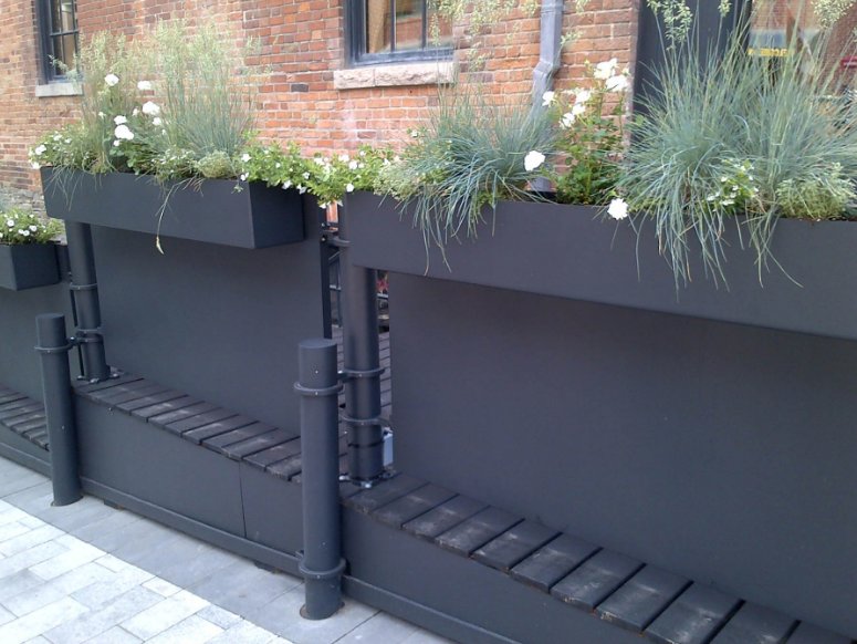 hausersite's tweet photo. Our planters add a nice touch of greenery to #Toronto's Market Street! #HauserInstall https://t.co/1JdH0VY380 https://t.co/fdCCmFeinr