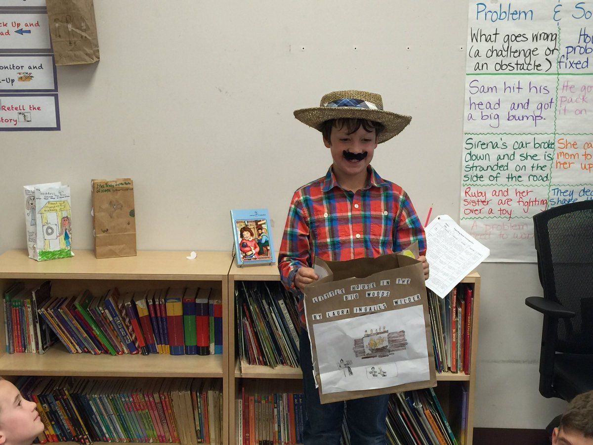 ACzember's tweet photo. We like to dress the part when presenting our paper bag book reports. #literacy #literature #prairiewaters https://t.co/mHfxnHaAOw