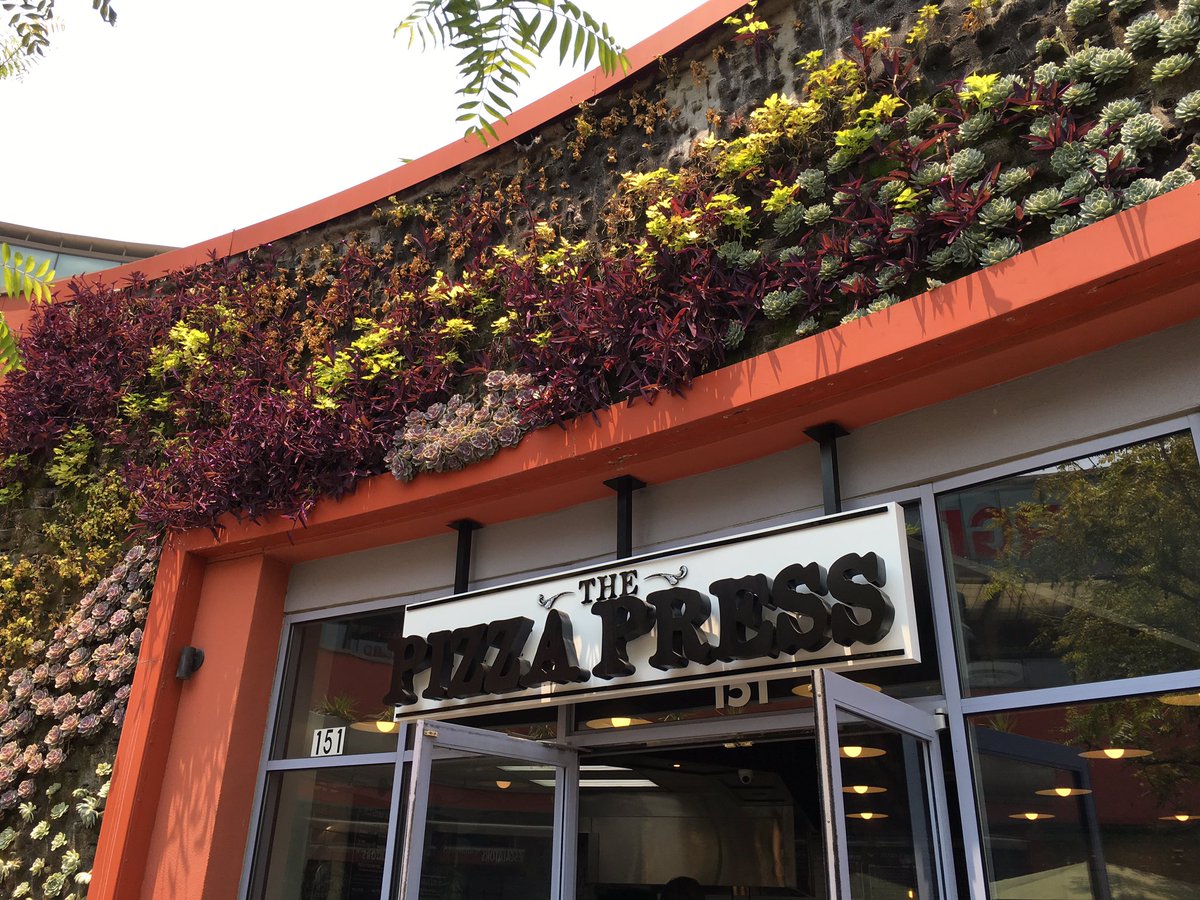 BrianaGiovanna's tweet photo. Look at that beautiful decor around @thepizzapress sign in #WeHo #GoodEatsLA #pizza #Yum https://t.co/nlLBIq5RFi