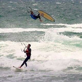 Kitaddict's tweet photo. Bertrand Beauchet flying over Jeremy Lentz ✈😉 #lasalie #waves #surfing #kitesurfing #kiteb… https://t.co/ER15E1cIJE https://t.co/cvqTglUQ7Y
