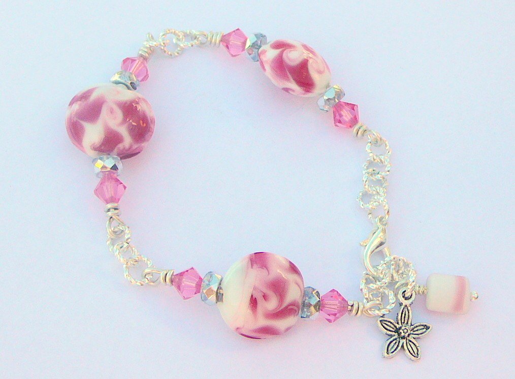 beadsme's tweet photo. Pink Swarovski Crystals Teamed With Pink Swirling Lampwork Bead… https://t.co/Eqx3O4Mml4 #jewelryonetsy #MultiLength https://t.co/TNPMymMLVZ