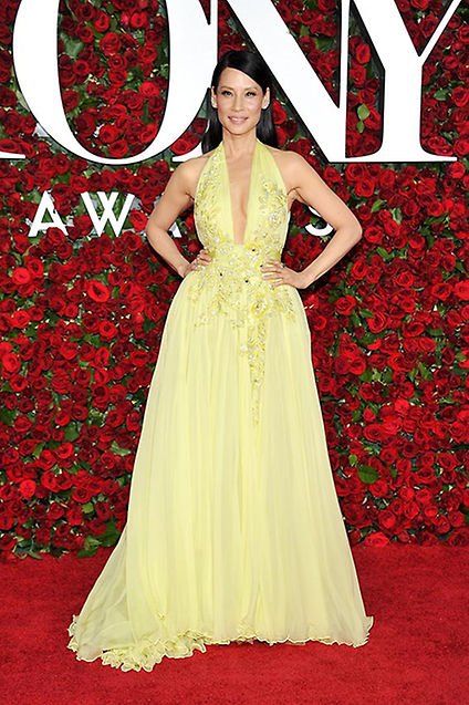 mcgt007's tweet photo. Lucy Liu wearing a Zuhair Murad yellow dress at the Tony Awards 2016 https://t.co/og0OBB1uLy