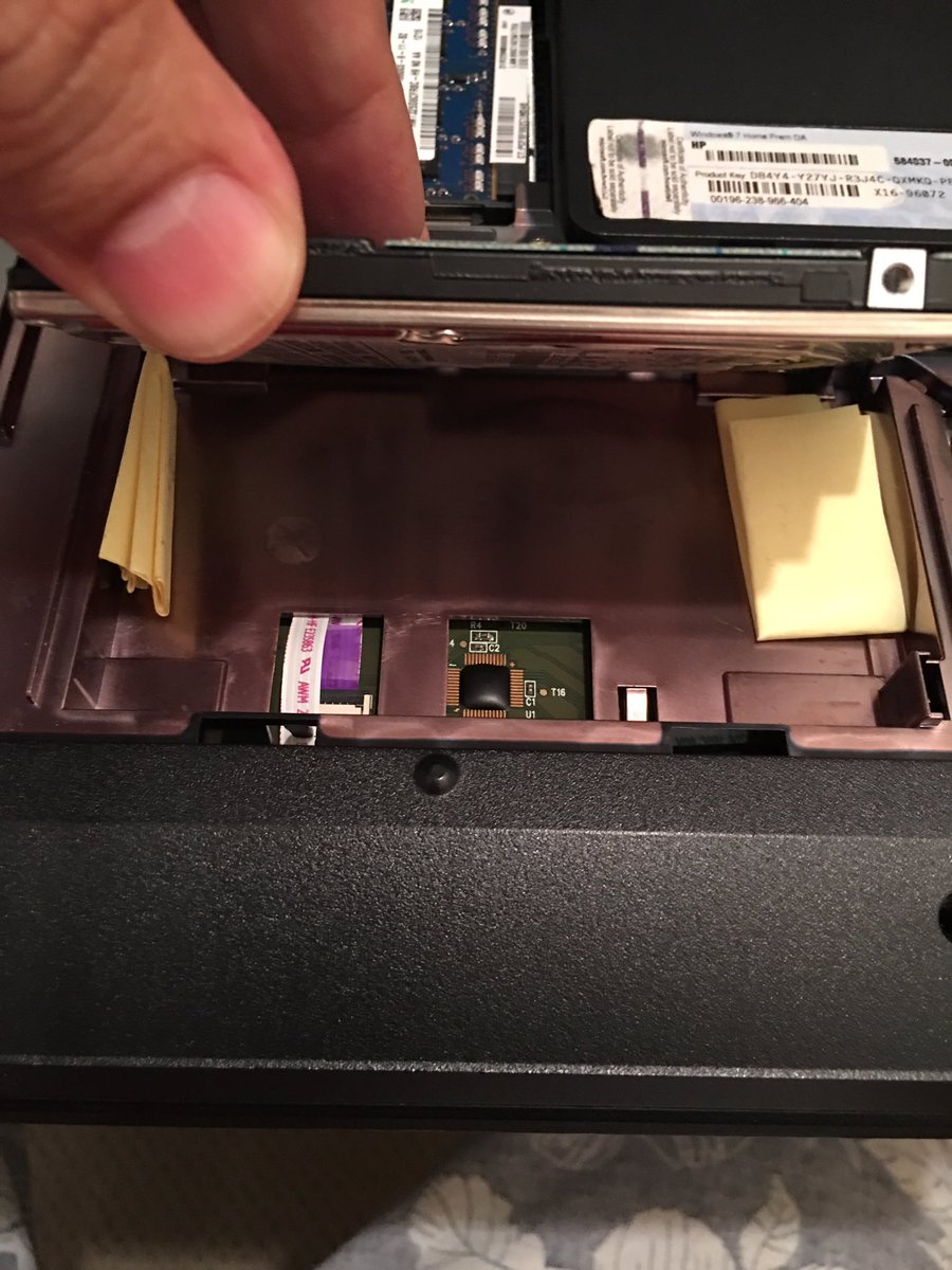 This is what happens when you hire bad techs. Yes those are postit notes folded up to secure someone's hard drive!