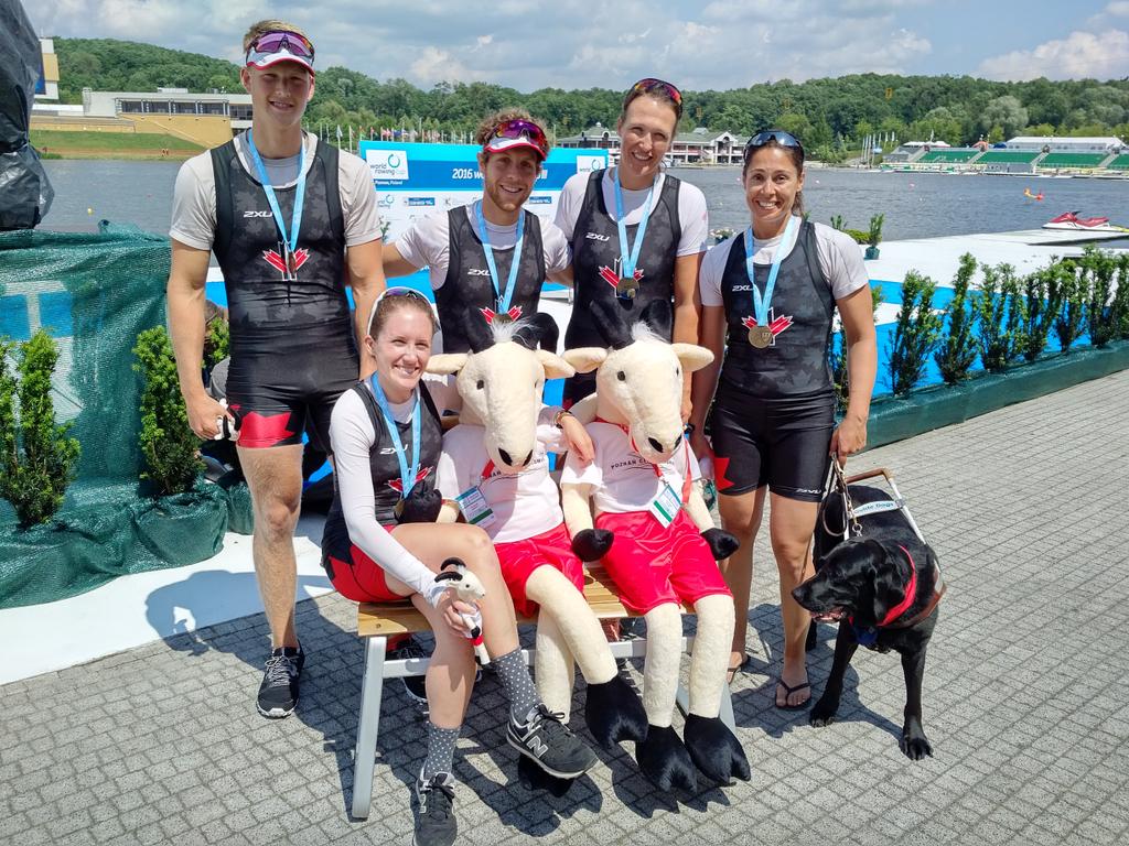 P_Cookson's tweet image. LTA4+ with Poznan mascots and Gold Medals @rowingcanada