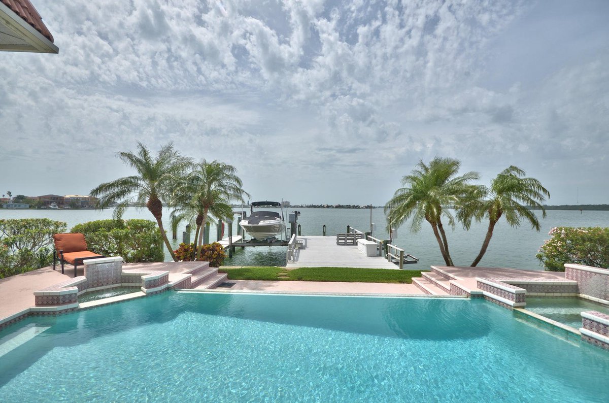 New waterfront listing - 4000 sq ft, 113' of seawall, room for 65'+ boat. Redington Beach. floridaluxurycollection.com.
