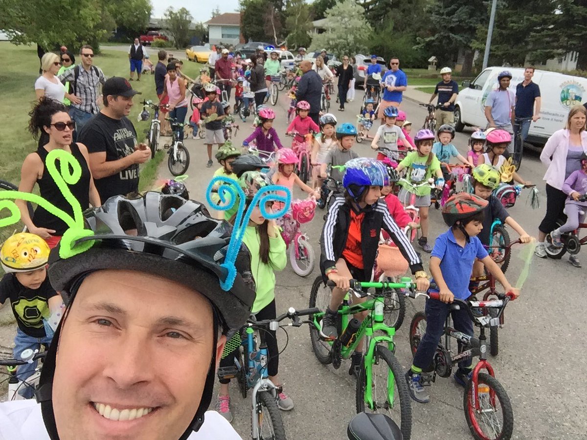 GregClarkAB's tweet photo. #yycneighbourday is all-around awesome, but leading the @ElboyaHeights kids bike parade is a definite highlight! https://t.co/efZnPNBQkm