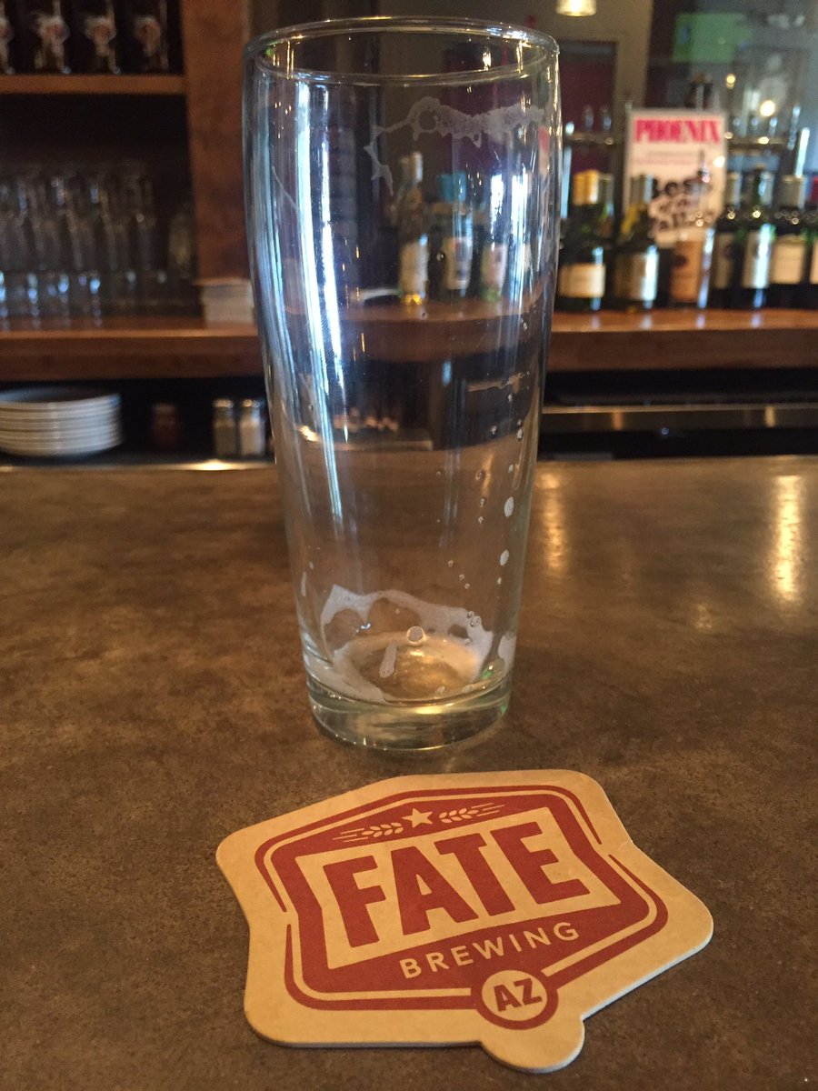 An empty pint glass, waiting to be replaced, here at Fate Brewing a month before the rebranding #drinkazbeer