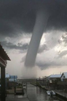 TRAVELSnCHASES's tweet photo. #otd 3 years ago  6-19-13 #GrandeIsle #Louisiana had a very photogenic #waterspout #tornado #LAwx  pics from the web https://t.co/uMghNIxRWx