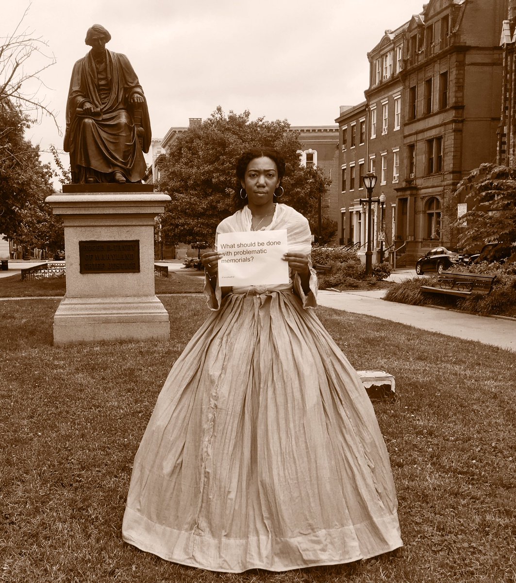 Their_Child's tweet photo. I stand here demanding respect 4 my ancestors. TWO Taney statues n MD disrespect their fight 4 equity #TaneyMustFall https://t.co/xTqFl52Tg6