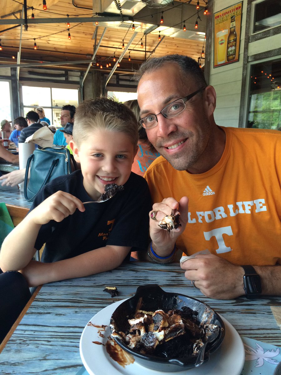 drpowers1's tweet photo. Seely and Dad having a #chocolateattack via campfire smores @BransonLanding @MrPowersCMS https://t.co/lIzLIlMUmn