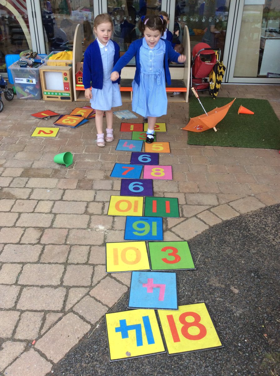 EYJesmondG's tweet photo. The girls are having fun making a hopscotch from the number tiles! #maths #problemsolving #outsidemaths https://t.co/QybsevEGL1