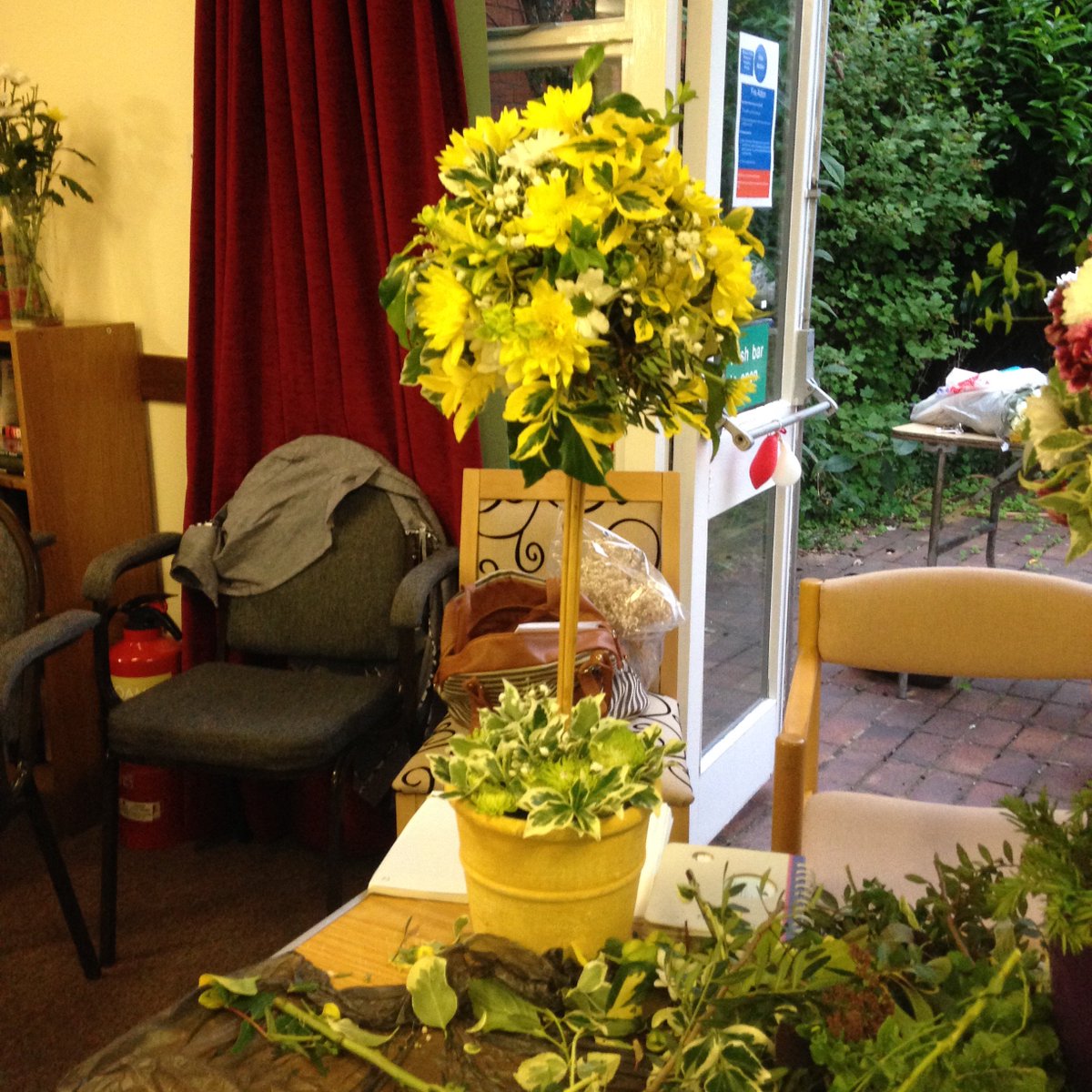 BaschurchWI's tweet photo. Making topiary tree arrangements led by @Christinemlk #flowersinjune https://t.co/OntDGaUY2E
