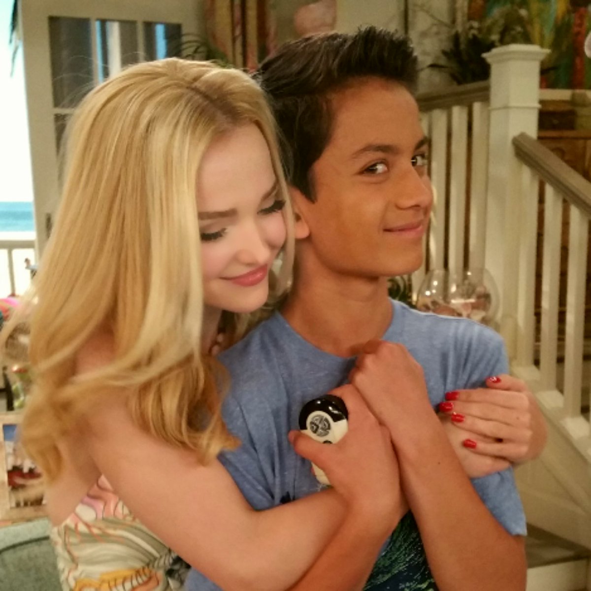Scatter's tweet photo. That awkward moment when you realize she's A LOT more into this hug than you are. #LivAndMaddie #SeriesFinaleWeek https://t.co/u5F8Tc8X22
