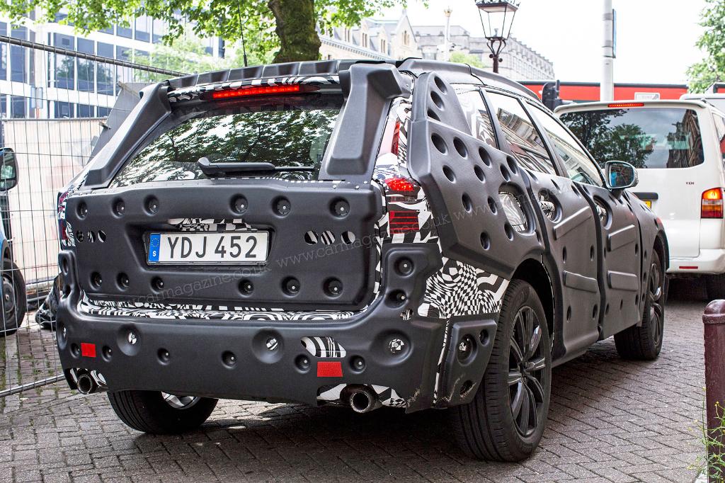 CARmagazine's tweet photo. The Swiss cheese of car camouflages! We scoop new #Volvo XC60 in bullet-ridden disguise https://t.co/XLkZEuuBYn https://t.co/zHrlQWnW4w