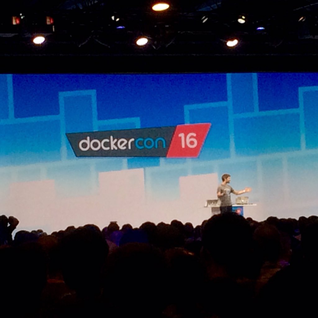sonjahall's tweet photo. "So many laptops up here ready to live demo, they had to build us a special table." - CTO @solomonstre #DockerCon https://t.co/Q2KTKLiUqE