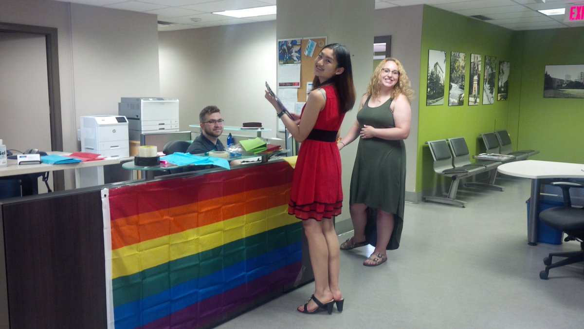 rsustainability's tweet photo. The @rsustainability and @RyersonFixit team decorating for #DisplayYourPride @RyersonU! #PostiveSpace https://t.co/D2oQMNOi6l
