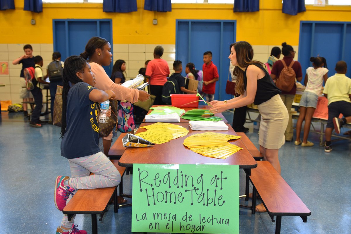 dcpublicschools's tweet photo. .@garrisondcps students choose free books and parents learn how to support summer readers at home. #DCPSReads https://t.co/vNOr59kbiq