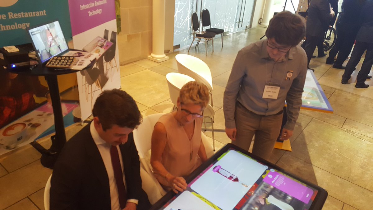 Yvan_Baker's tweet photo. Checking out the interactive table with Premier @Kathleen_Wynne for #CanadaUAForum. #onpoli #CanUATrade https://t.co/S9MxLsI6kd