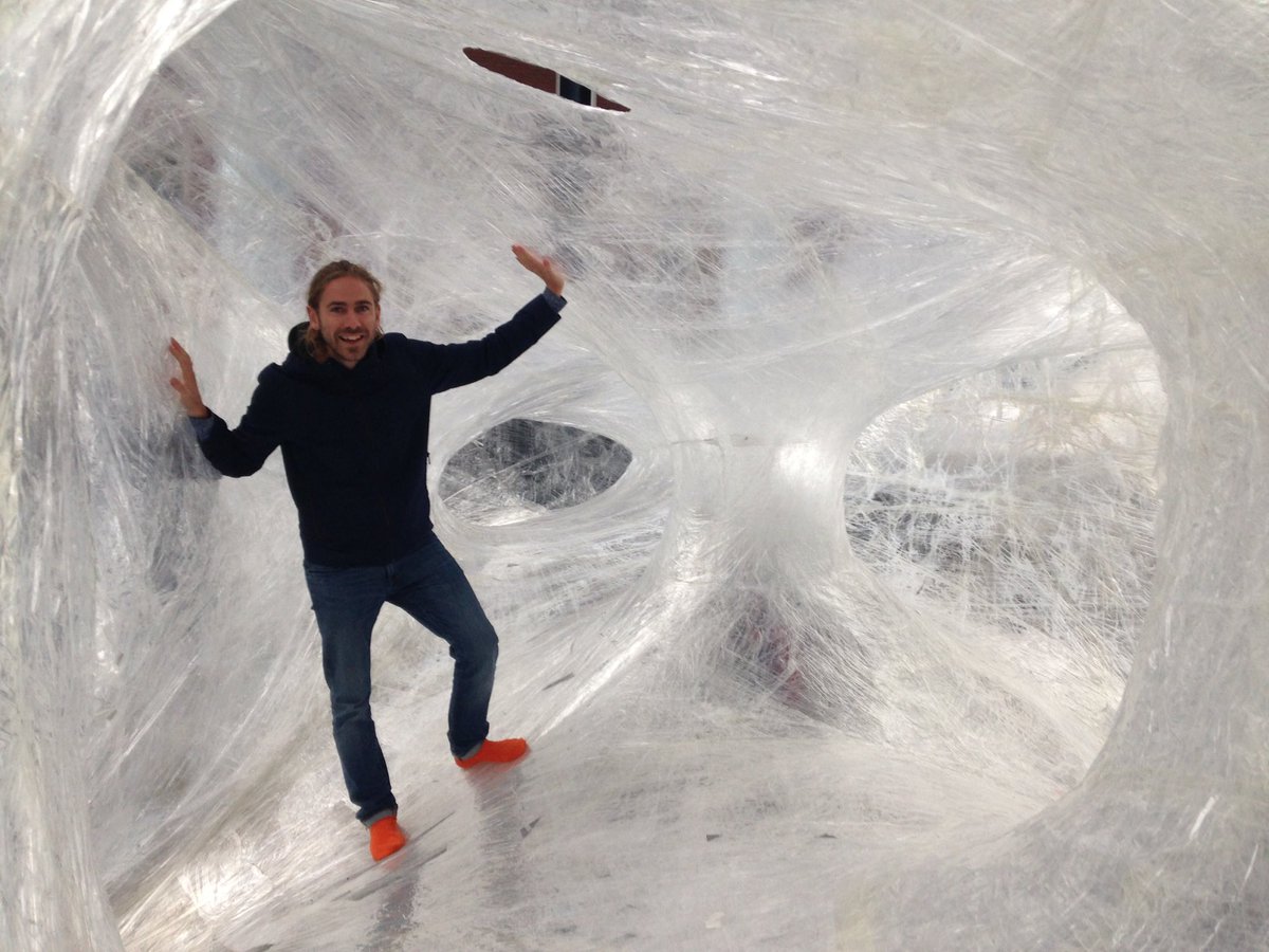 ollywainwright's tweet photo. Amazing installation by Croatian artists Numen using 14 miles of sellotape as part of Rotterdam's @ZigZagCity https://t.co/KG2HoLtbfK