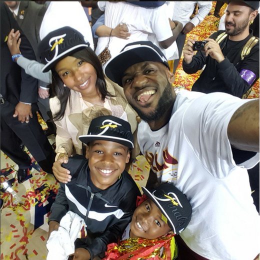 Essence's tweet photo. MVP @KingJames is also a superstar dad and husband with the cutest family ever: https://t.co/LAw9gT78sA https://t.co/dP0c4hHGMq