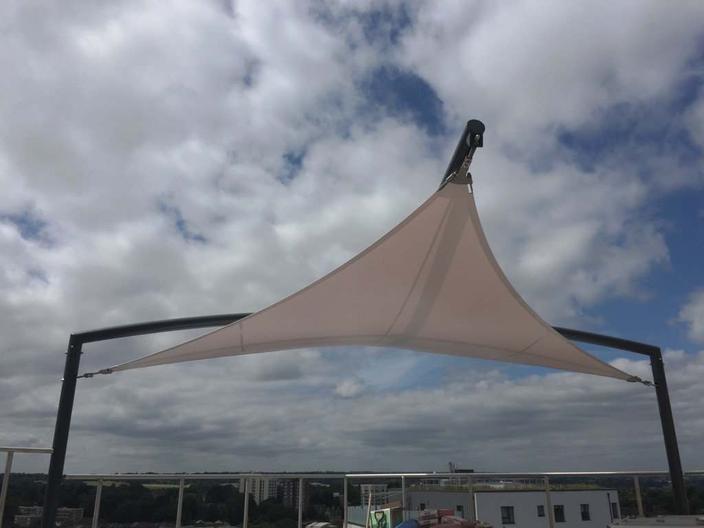 Sail goes up at green dragon house. Looks great.