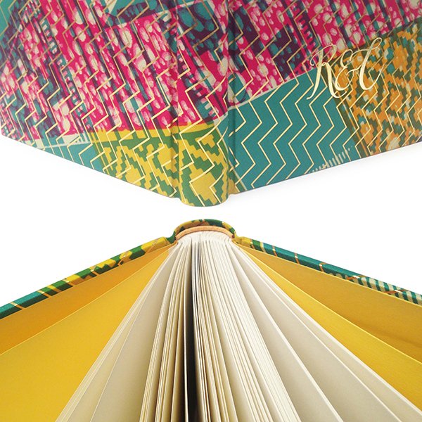 wbookbinding's tweet image. Who wants white when you could go brighter than bright!? Bespoke #africanfabric #wedding #guestbook 🍃🔶💜🔴💛🔷⚡️