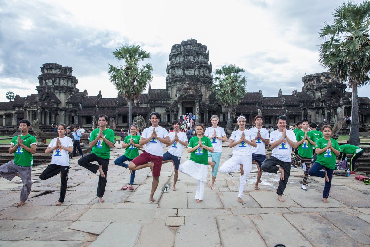 MEAIndia's tweet photo. An ancient discipline strengthens old bonds. #YogaDay celebrations at the iconic Angkor Wat temple in Cambodia https://t.co/qEZwVxSRY1