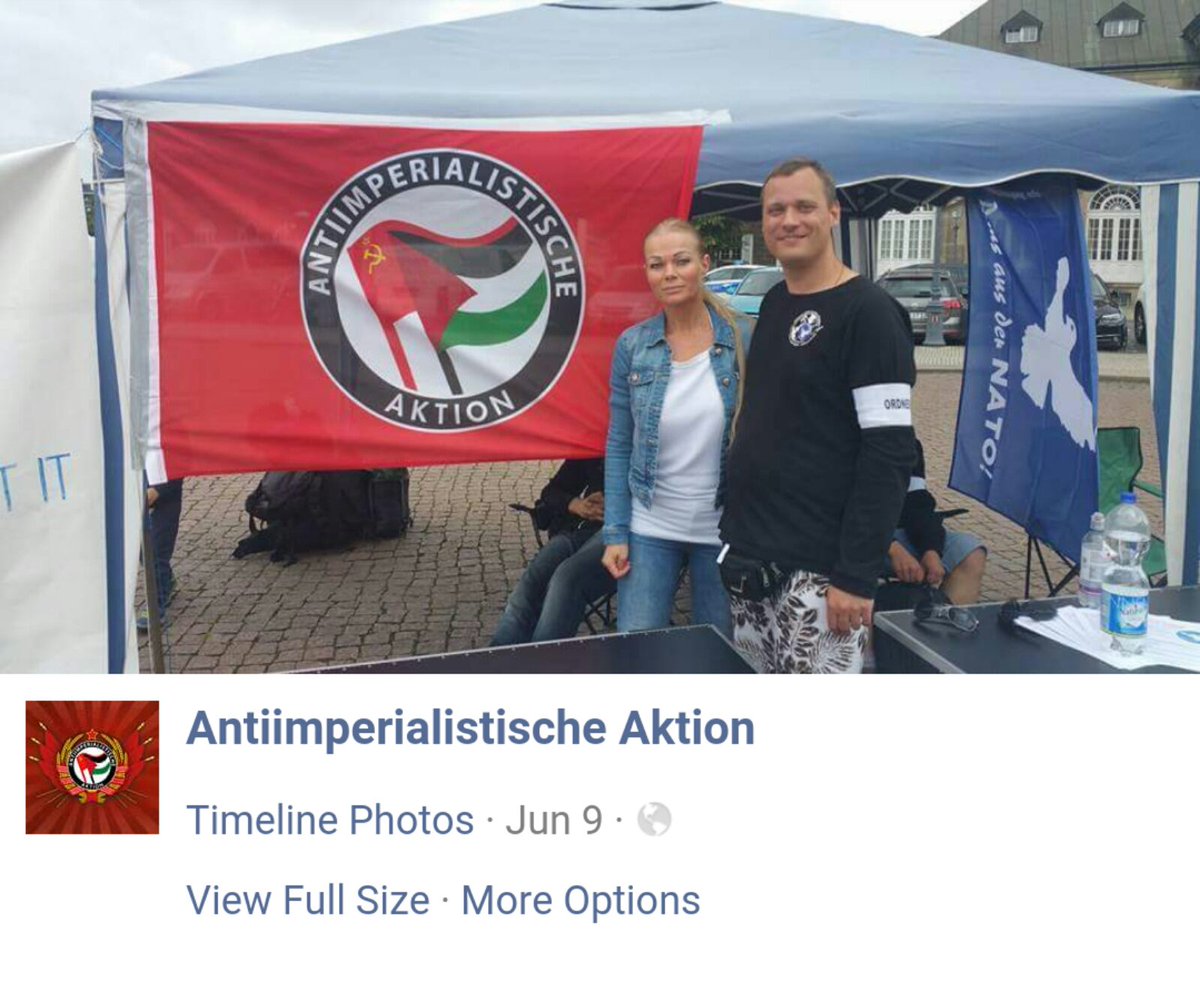 SvenIsHell's tweet photo. Frau (M)Oertel "post" vor/mit einer Fahne. #nopegida #endgameOver #killingbraincell https://t.co/afGxY9HYHt