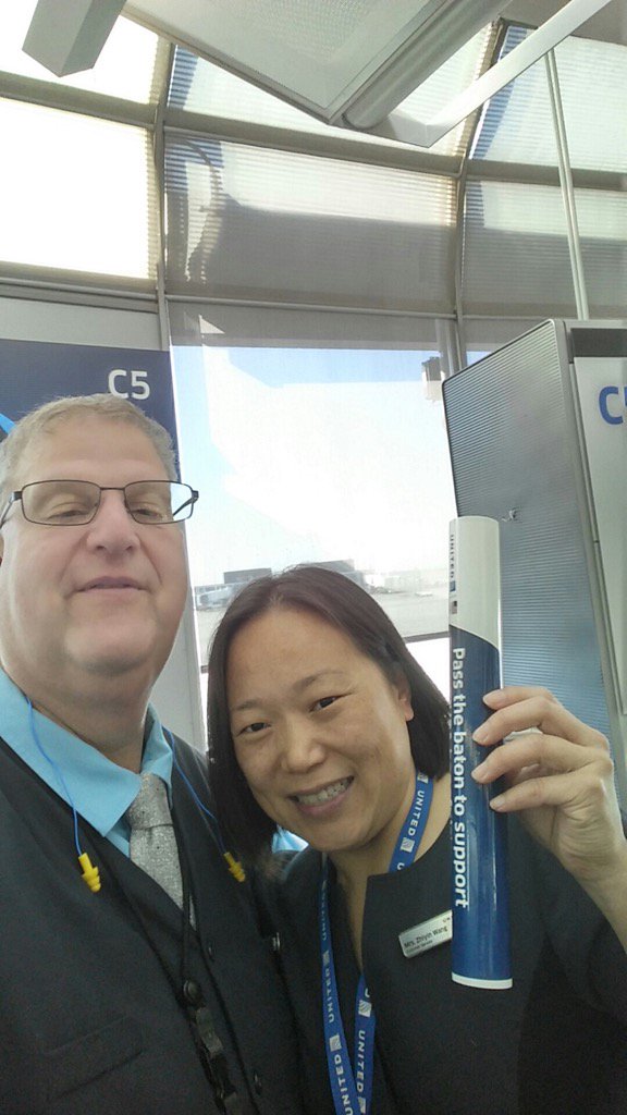 Mr Gross and Ms. Wang passing the baton #UABatonDonation