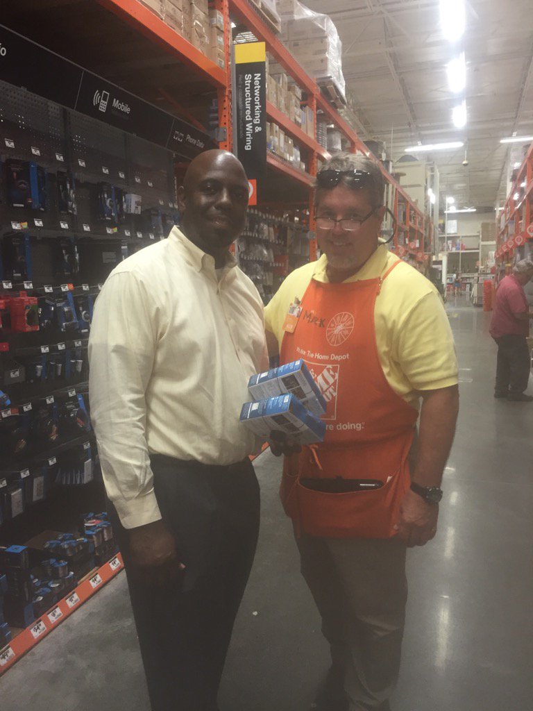 Mark helping a customer at 153 during specialty Tuesday.