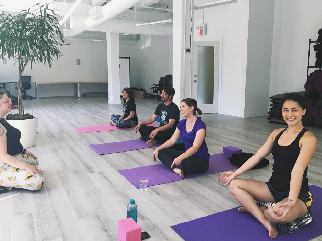 Shopify's tweet photo. Celebrating #YogaDay here in the office #LifeAtShopify https://t.co/LrnYvBL37A