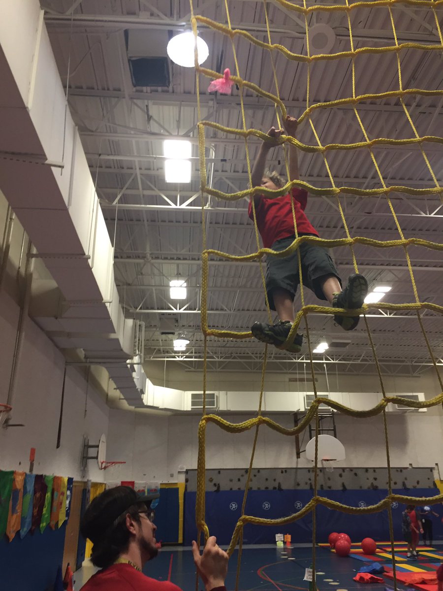 JodyManning's tweet photo. Little man scales the cargo net on Field Day like a spider monkey! @teachnpe @CBounet #brcpride https://t.co/sszqlJMAmx