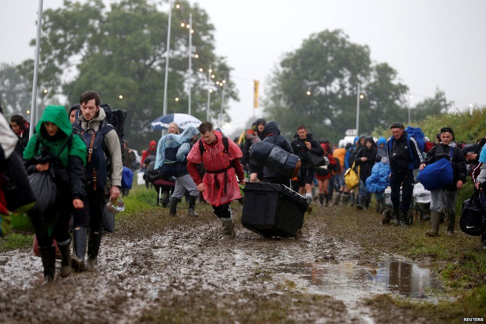 People travelling to @GlastoFest are being being advised to hold off because of bad weather. But the gates are open