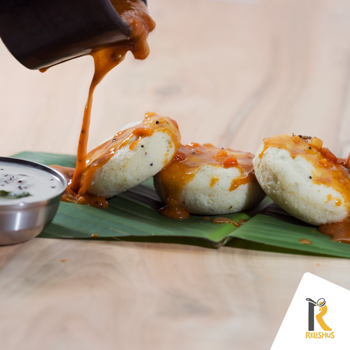 Relishus's tweet photo. Try our traditional Rava Idli for their piping hot texture and delightful, steamy aroma. https://t.co/L23If3RQsB https://t.co/o9rO1MlRCL