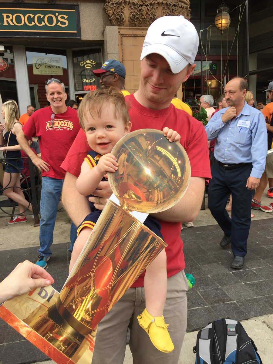 clevelanddotcom's tweet photo. Edward O'Hare of Shaker Hts Two https://t.co/a4YA4W2Cro reporters are roving parade with trophy cutouts. #cavsparade https://t.co/GzGxDSQo1r