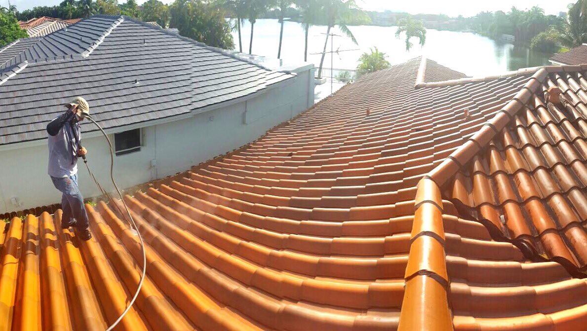 Pressure cleaning being done at a clay roof. #Roofing #Construction #Repair #Cleaning