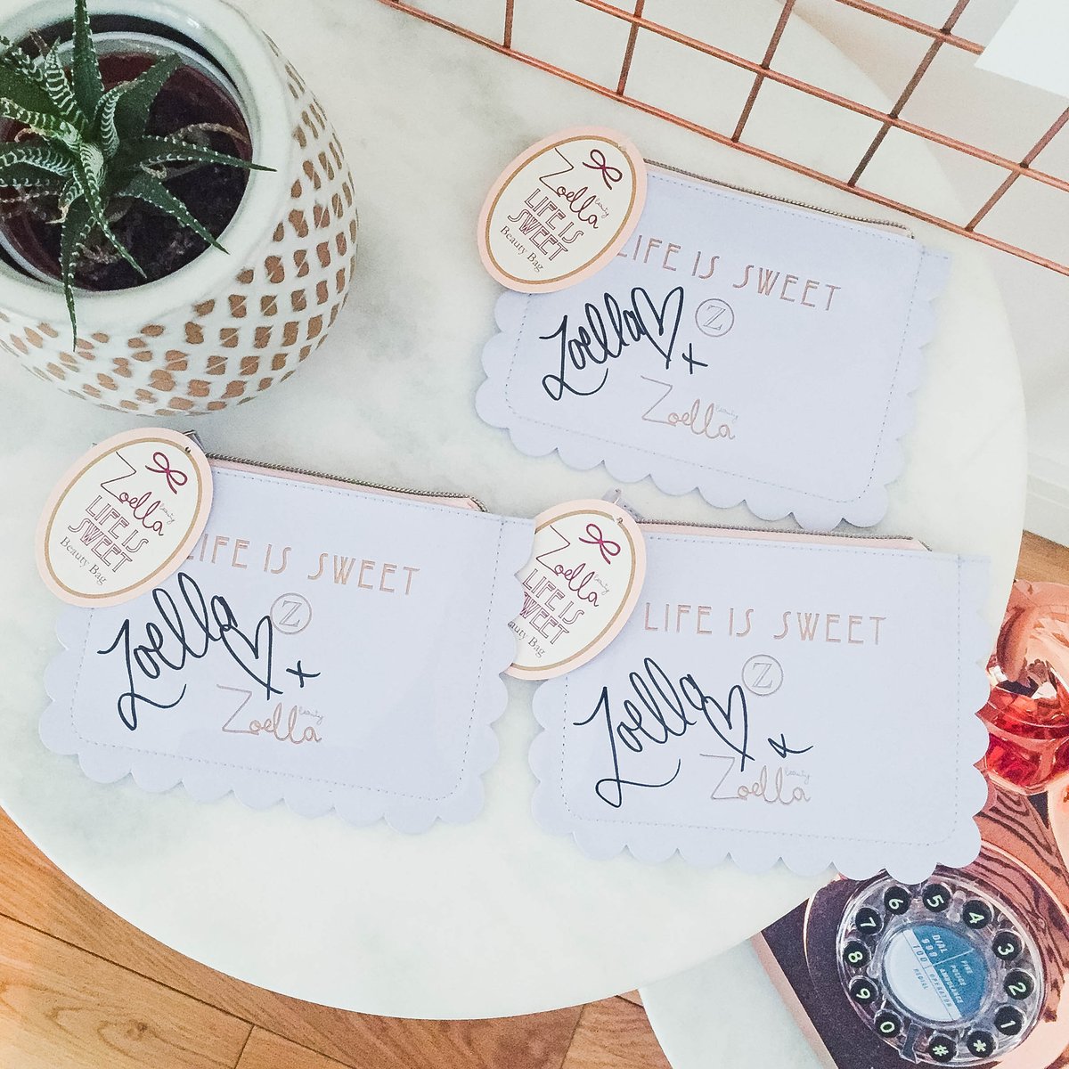 Zoella's tweet image. COMPETITION TIME! Follow &amp;amp; Retweet to win 1 of 3 SIGNED Life is Sweet Bags! T&amp;amp;Cs here: bit.ly/1MW2INm