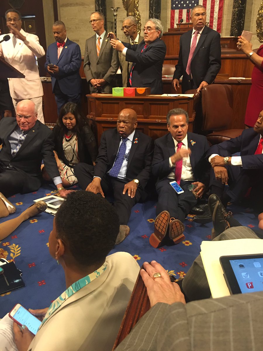 CoryBooker's tweet photo. John Lewis @repjohnlewis and other members sitting in on the house floor for a vote on gun safety. #holdthefloor https://t.co/ARJs0sZjfW