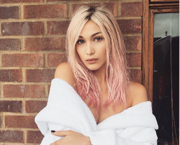 taglyapp's tweet photo. LOVING the new blonde &amp; pink look from Bella Hadid. 💕 https://t.co/GuKaxyEIKa