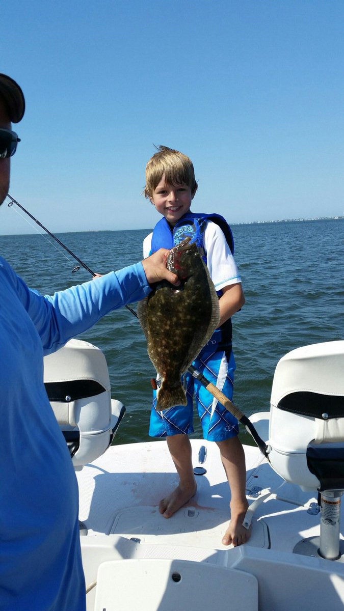 Carson from PA.  18.5" fluke in the bay near #LBI recently. #kidsfishing