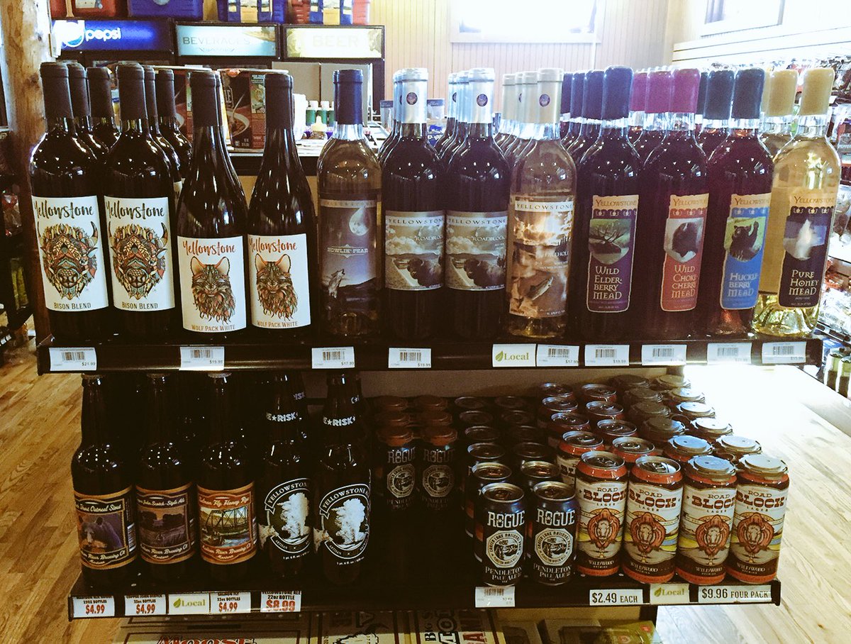 MangiaMike's tweet photo. What a great end cap displaying exclusive Yellowstone beer and wine! #onlyinyellowstone #bisonblend #wolfpackwhite https://t.co/0dMdDFHPcc