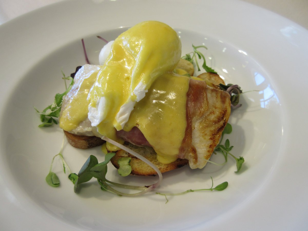 Seafood breakfast..prawn &amp; rocket fritters/prosciutto wrapped fish poached eggs &amp; hollandaise