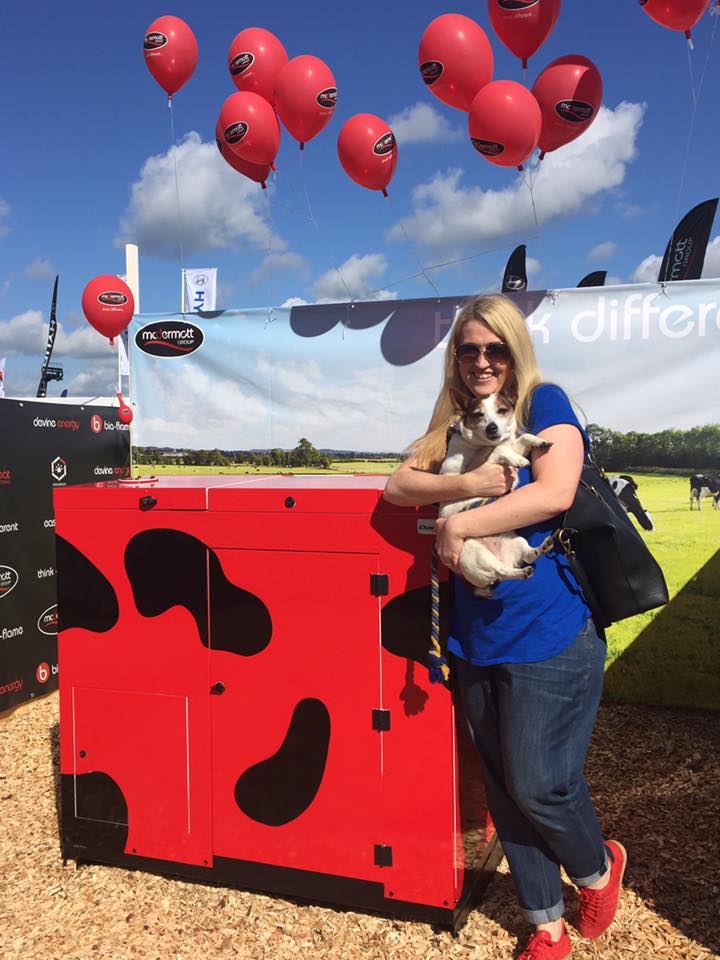 Clue to our competition one of our stand visitors showing off beside our Dairy Pod <a href="/bioflameboilers/">Bio-flame Boilers</a> <a href="/ScotlandRHShow/">Royal Highland Show</a>